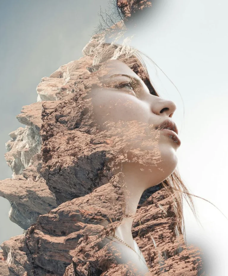 Artistic double exposure of a woman’s face merged with rocky mountains, symbolizing emotional durability and resilience in fashion. Created for C2 Fashion Studio’s work in trend forecasting as a leading trend forecasting agency.
