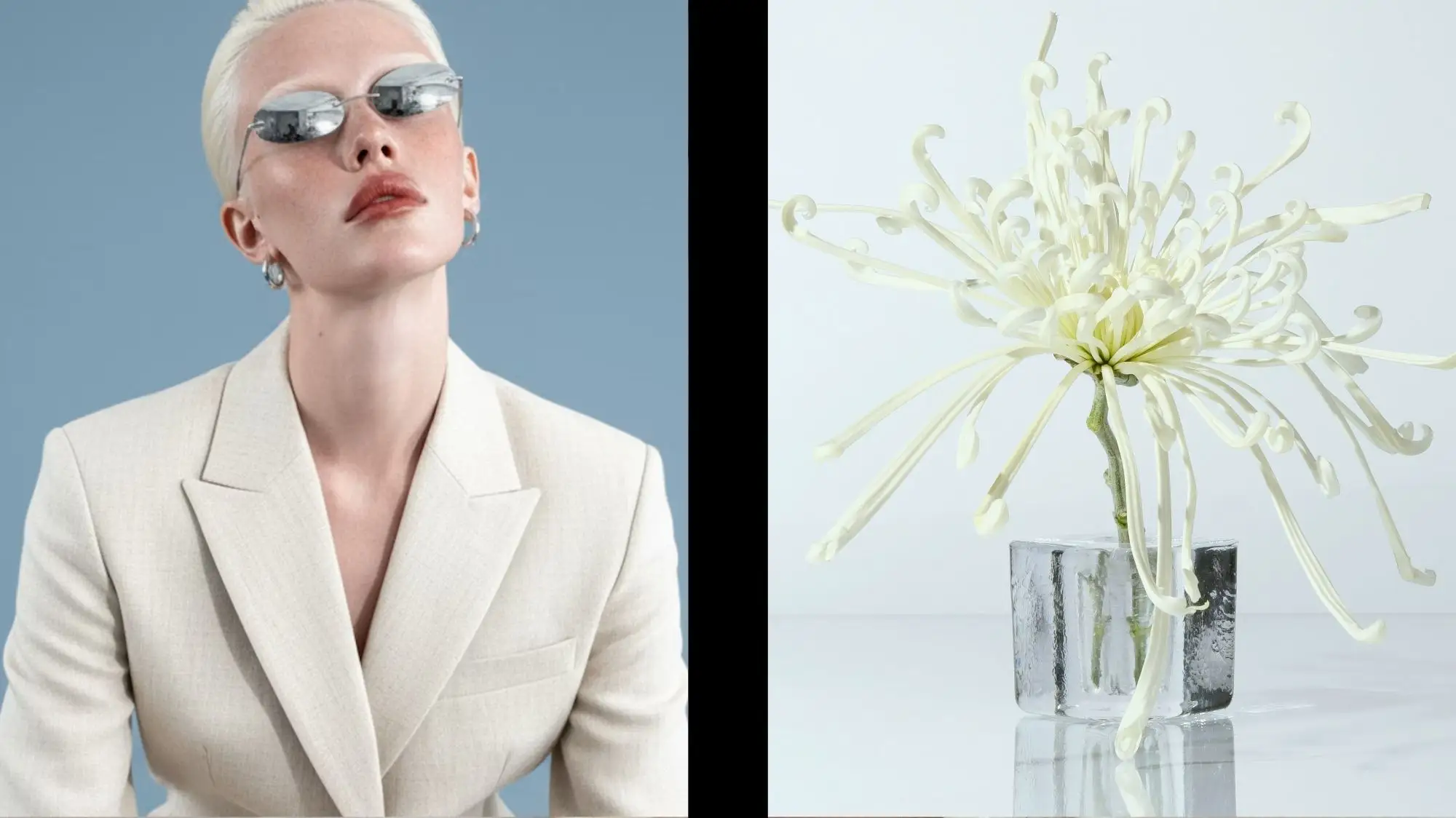 Futuristic model in minimalist ivory suit with chrome sunglasses beside a sculptural white flower in glass vase — representing adaptive fashion, emotional design, and sensory innovation from C2 Fashion Studio’s Fluid Identities trend forecast.