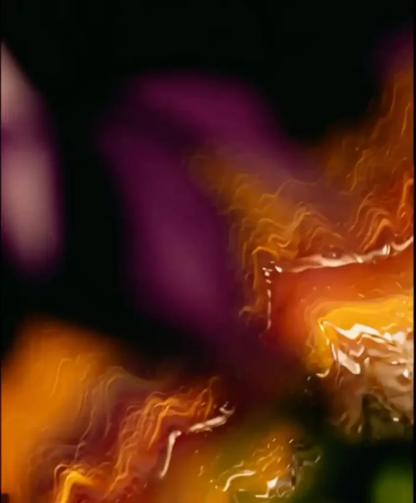 Abstract blend of orange, purple, and gold tones symbolizing Conscious Vitality — the C2 Fashion Studio macro trend for Spring Summer 2027 centered on awareness, mindfulness, and emotional intelligence in fashion.