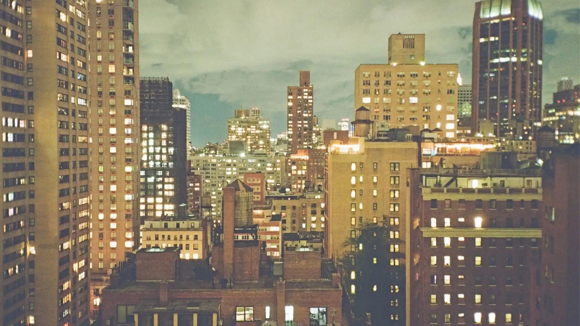 Urban city skyline at night reflecting cultural context and lifestyle signals shaping Pre-Fall 2026/27 fashion trend forecasting and strategic presentation.