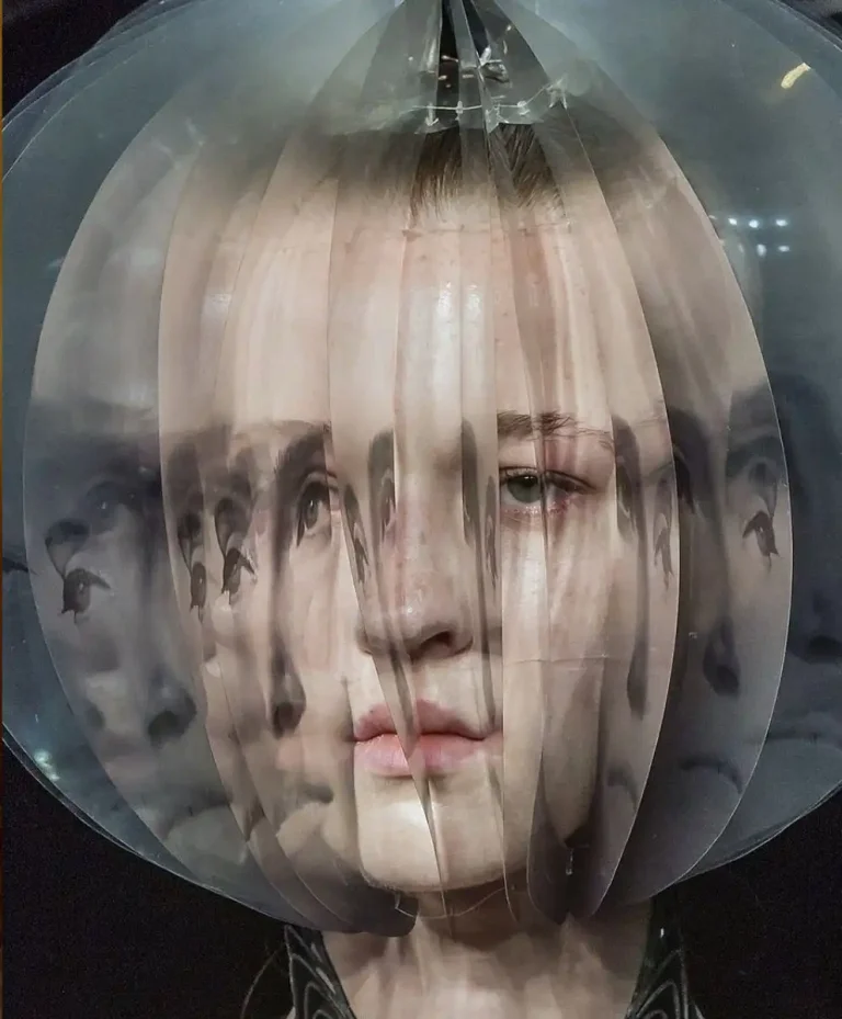 Biometric fashion headpiece exploring mental wellbeing and inner balance, representing wellness-driven fashion trends for Autumn Winter 2027 2028.