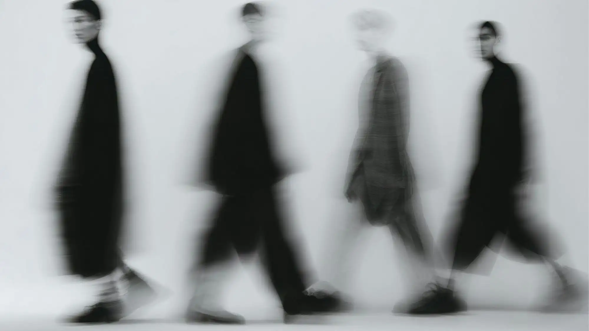 Fashion Trend Forecasting image featuring blurred moving silhouettes in monochromatic tones, representing evolving consumer behavior, cultural transformation, trend intelligence, and the dynamic pace of change shaping Autumn Winter 2027 2028.