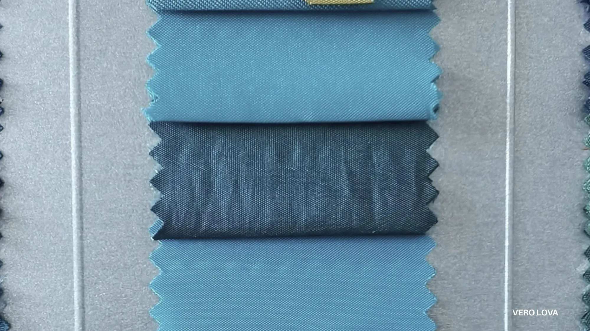 Blue textile swatches highlighting material and color development for SS2027 and AW2027/28 fashion trends, C2 Fashion Studio trend forecasting.