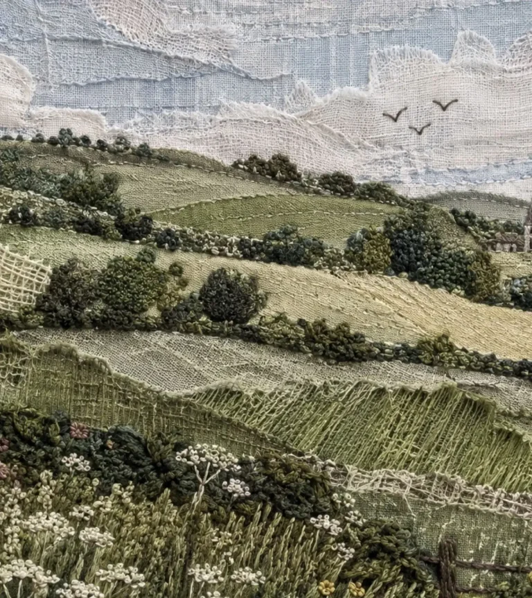 Handcrafted textile landscape with embroidery and layered natural textures reflecting London Fashion Week Spring Summer 2027 trends by C2 Fashion Studio.